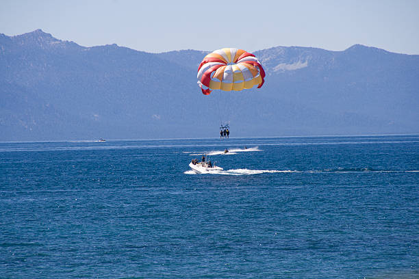 Parasail on Lake Tahoe  parasailing stock pictures, royalty-free photos & images