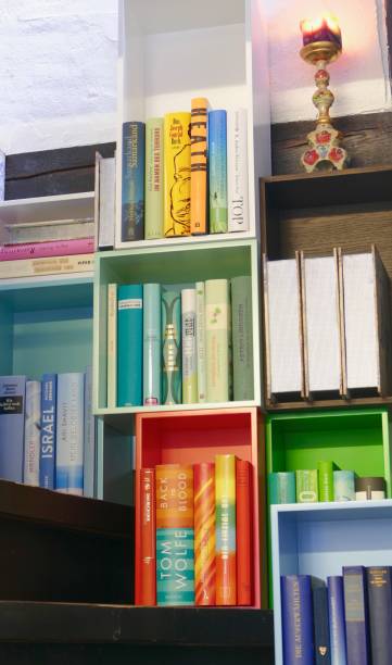 istock Colorful book shelves packed with books 916175694