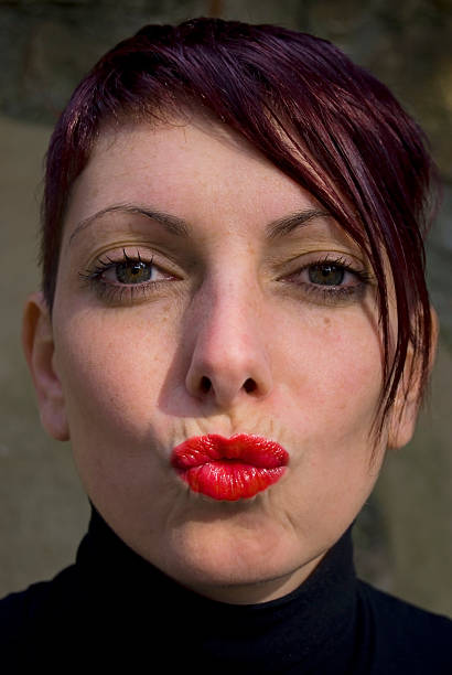 istock Woman kissing 91617614