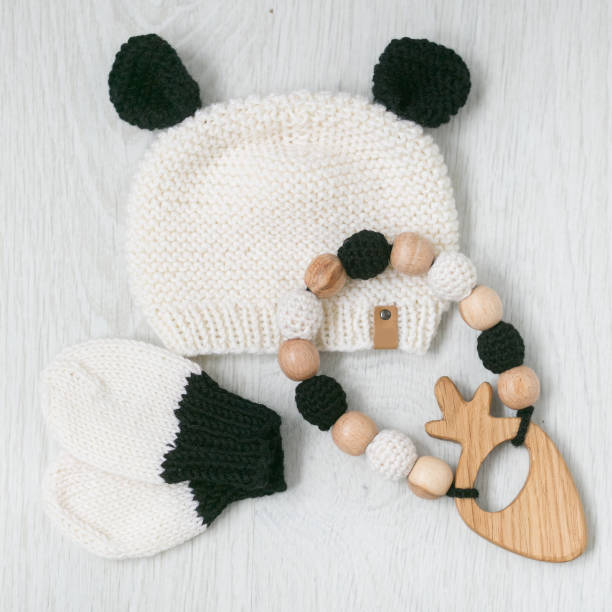 istock cute cozy knitted newborn panda set 916177790