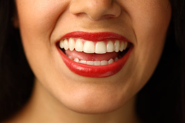 istock Close up of smiling mouth 91618100