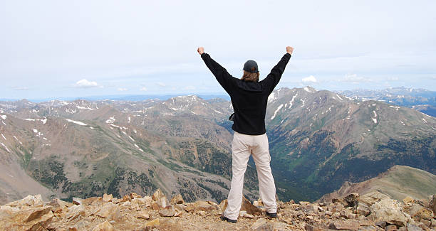 istock Young woman on top of Mt. Elbert 91618468