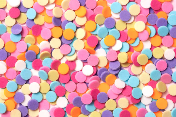 istock Confetti. Colorful dots view from above on a light background. Top view. Full frame 916184978