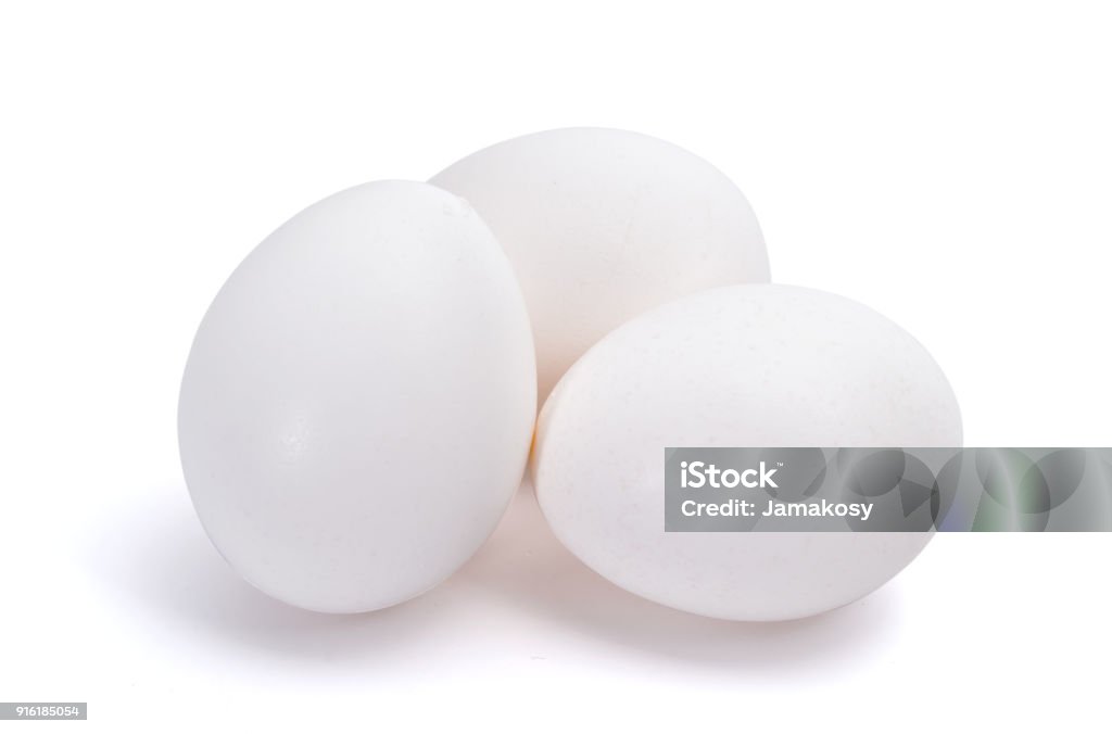 Group of three white eggs isolated on white background Group of white eggs isolated on white background Egg - Food Stock Photo