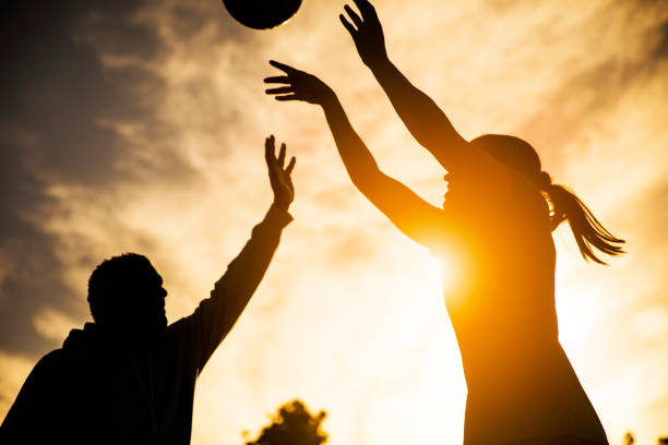 Father and Daughter Playing Basketball Silhouette