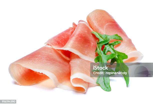 Italian Prosciutto Crudo Or Spanish Jamon Raw Ham On White Background Stock Photo - Download Image Now