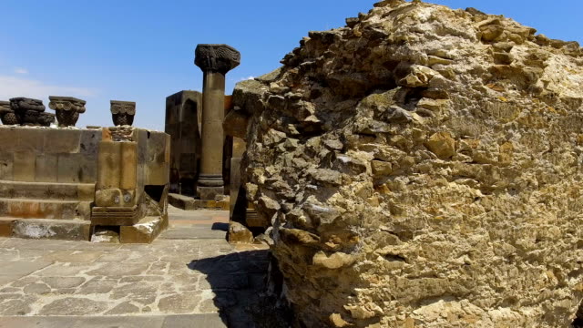 Remains of antique columns, stairs and altars of ancient cathedral, Armenia
