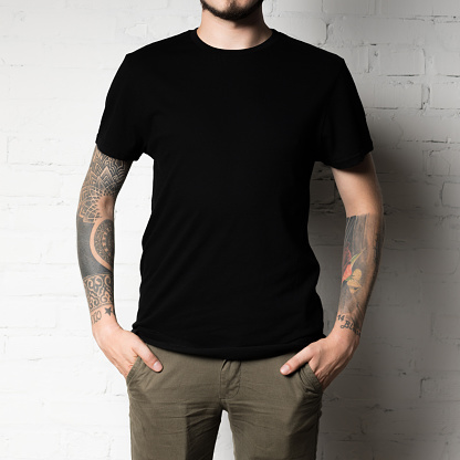 cropped shot of man in blank black t-shirt