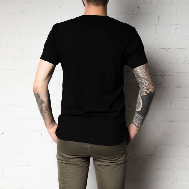 istock man in blank black t-shirt 916197750