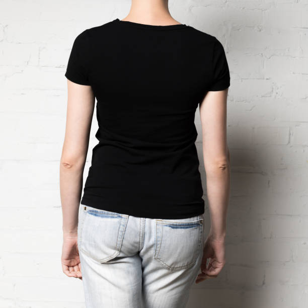 istock woman in blank black t-shirt 916197814