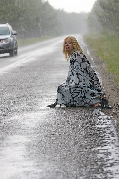 istock Woman is trying hitchhike 91619858