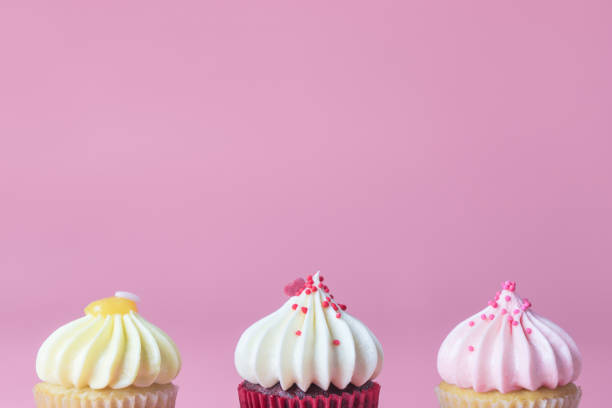 istock Three Mini Fancy cupcake on pink background, pastel tone 916200008