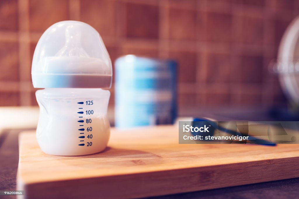 Baby formula in milk bottle Baby formula in milk bottle for a newborn baby feed Baby Bottle Stock Photo