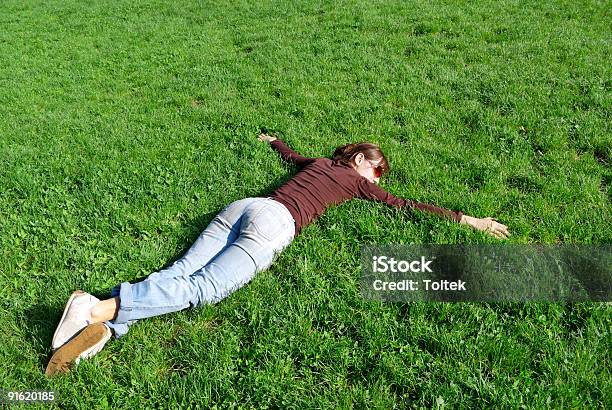 Calm Stock Photo - Download Image Now - Face Down, Lying Down, Women