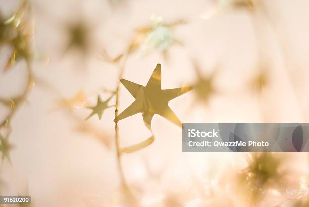 Foto de Luzes E Estrelas A Série De Festividades e mais fotos de stock de Formato de Estrela - Formato de Estrela, Esparso, Guirlanda - Objeto Decorativo