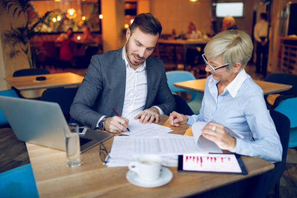 istock Young man explaining his business plans to his colleague 916205876