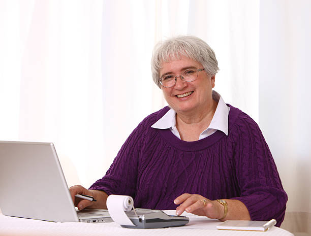 istock Senior woman working on finances 91620812