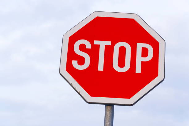 istock Stop traffic sign with blue clear sky background copy space 916208336