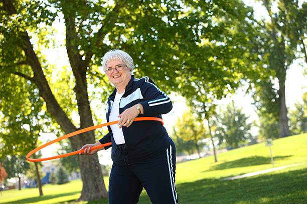 istock Senior woman with hula hoop 91620962