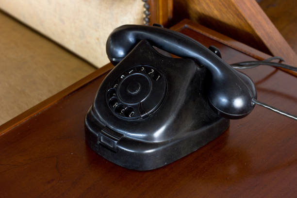 istock Old disk vintage dusty black phone on a desk 916211934