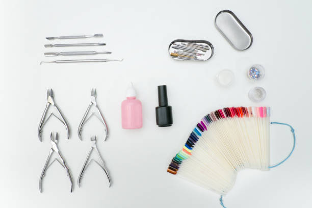 istock Manicure set. Tools, nail file, palette, care products. White background. 916215306