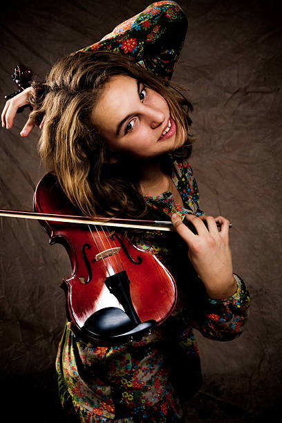 istock girl and violin 91621593