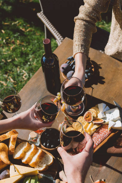 istock people clinking glasses of wine 916219460