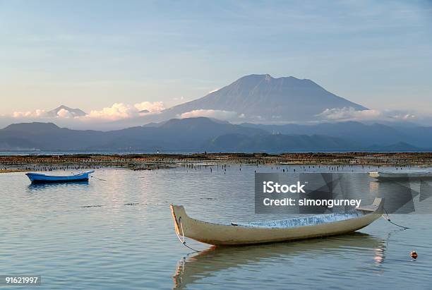 Mount Agung Volcano Bali Boats Indonesia Stock Photo - Download Image Now - Active Volcano, Asia, Asia Pac