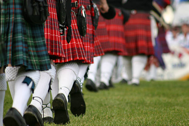 Scottish band marching  kilt stock pictures, royalty-free photos & images