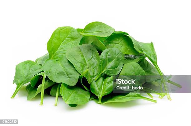 Pile Of Baby Spinach Leaves On White Stock Photo - Download Image Now - Spinach, Cut Out, White Background