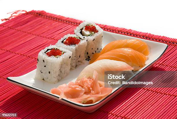 Foto de Prato De Sushi No Tapete Vermelho e mais fotos de stock de Arroz - Alimento básico - Arroz - Alimento básico, Comida, Comida e bebida