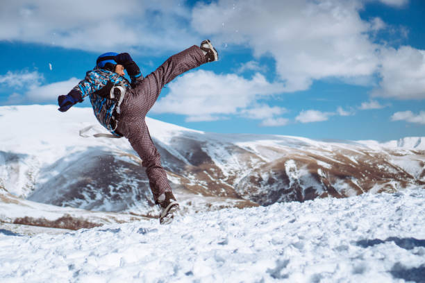 istock Young man enjoying a winter holiday 916230702