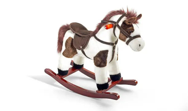 A white plush rocking horse toy