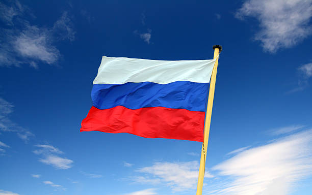 istock russian flag on blue sky background 91623597