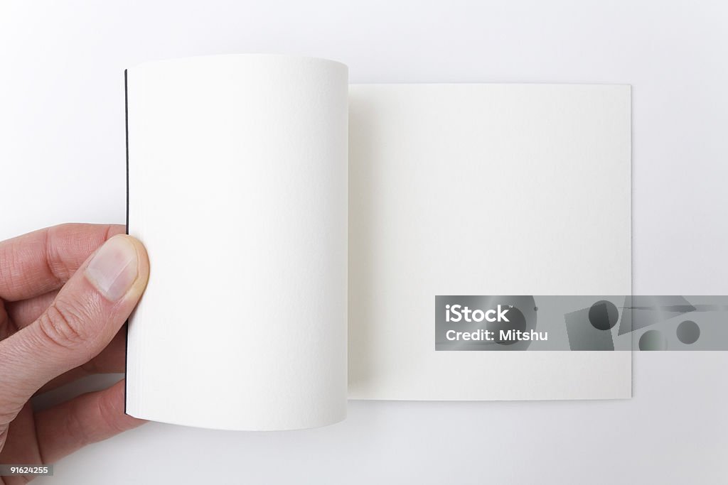 Abra mão de um Livro Branco, adotado páginas. - Foto de stock de Flip Book royalty-free