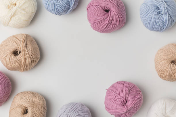 istock top view of scattered colored yarn balls  on white background 916245564