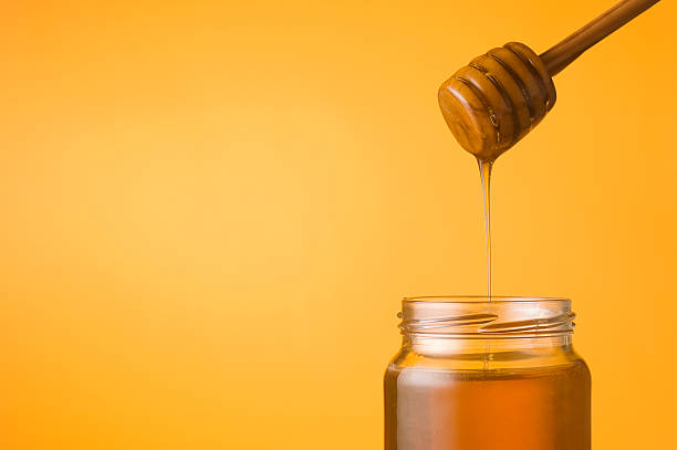 istock Honey jar and dipper 91624591