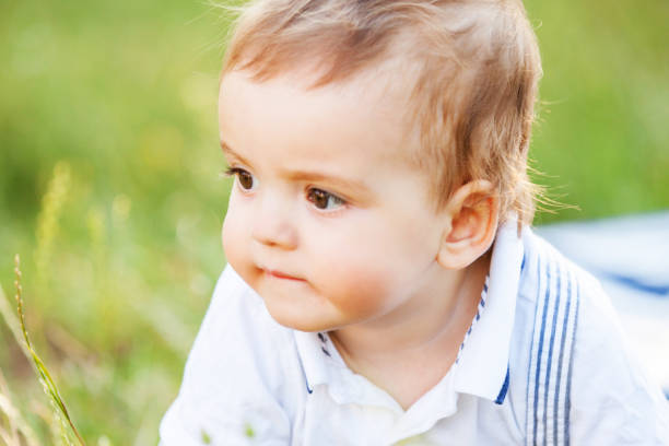 istock Cute Baby Boy at the Park 916248364