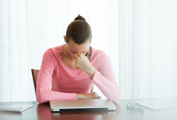 istock Stressed businesswoman 916252784