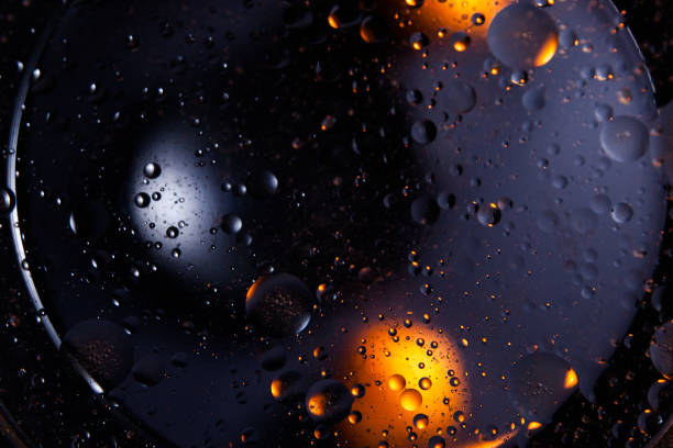 istock Abstract space background. Water drops of different colours 916257174