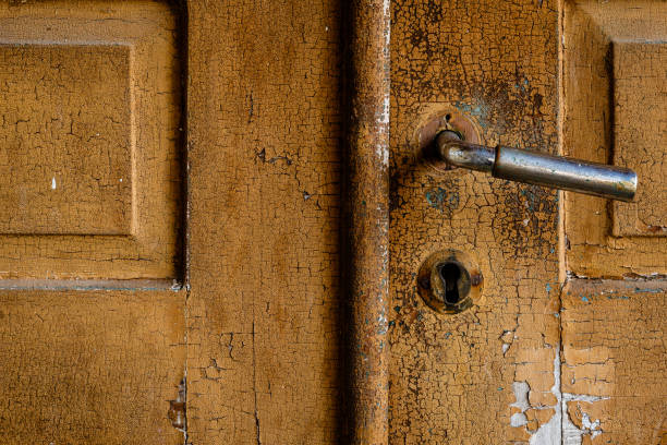 istock Yellow wooden door old 916260286