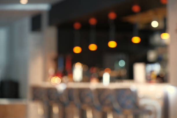 istock Blurry image of a cafe interrior background with bokeh 916263950