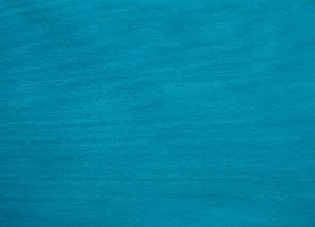 istock Blue canvas background. Stretched canvas rough texture. Blue teal painted canvas for navy banner template. 916270350