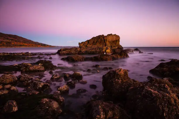 Sunset at the rocky intertidal zone beach at Leo Carrillo State Beach, California.