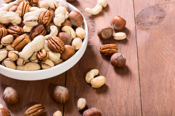 istock Mix of nuts in plate 916278892