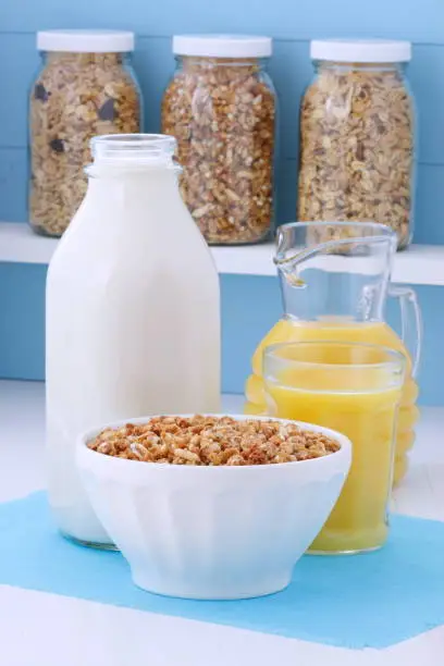 Delicious and nutritious lightly toasted breakfast muesli or granola cereal on vintage styling.