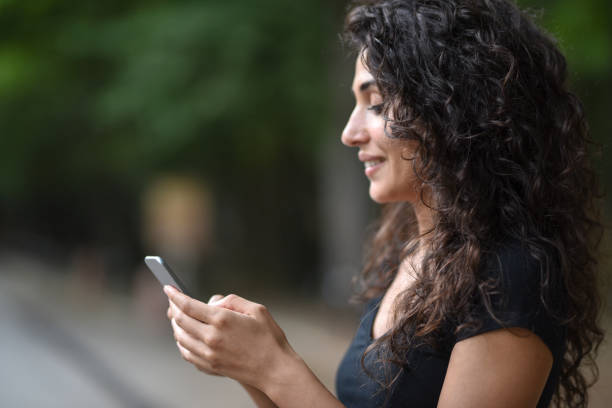 istock Young woman is using mobile phone 916287858