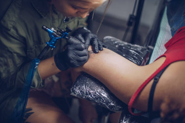 istock Woman loves tattoo 916287968