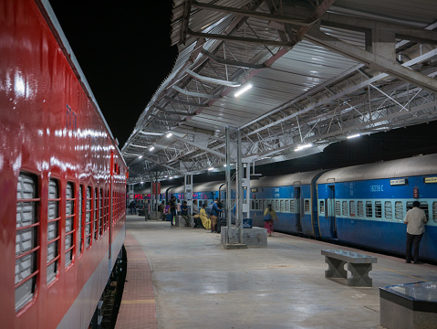 Mysore, Karnataka, India. January 14, 2018. Passengers are heading for their wagon before the departure of the night train from Mysore to Chennai.