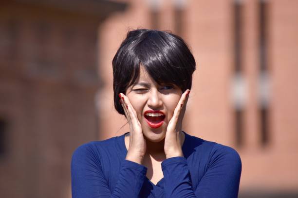 istock Surprised Attractive Person Wearing A Wig 916294558